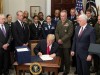 Trump signs defense