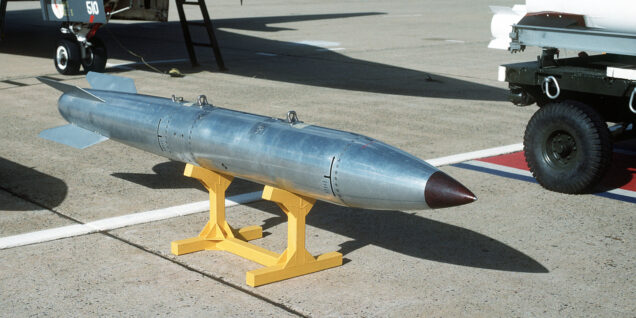 A view of a B-61 nuclear bomb trainer being shown at a static display of a 509th Bomb Group FB-111 aircraft.